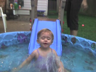 Kiddie slide plus kiddie pool equals kiddie fun